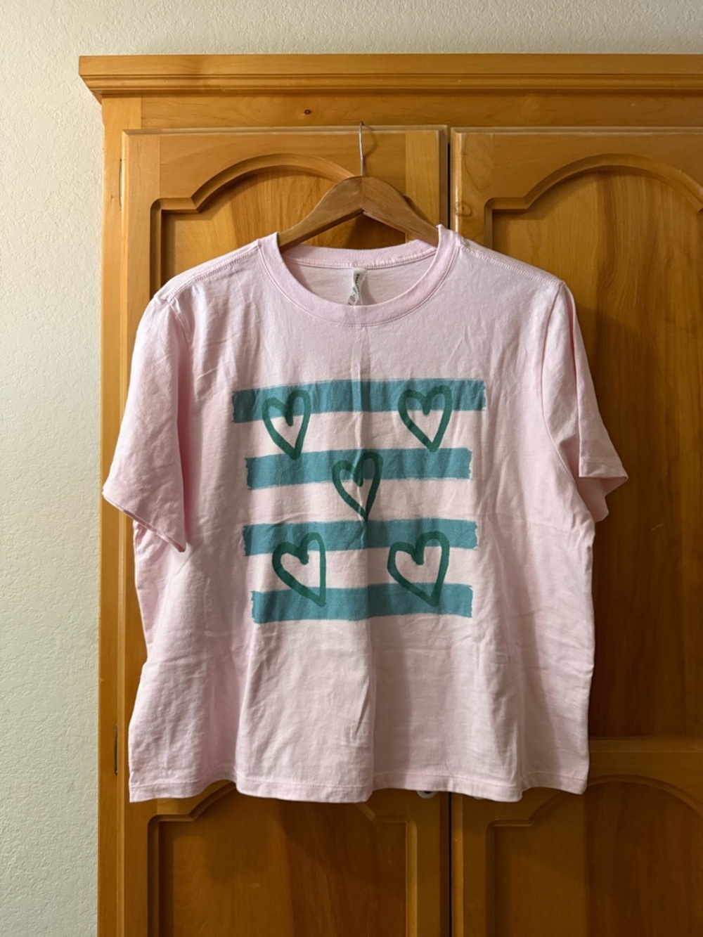 Pink Short Sleeve Tee with Teal Heart Stripe Graphic